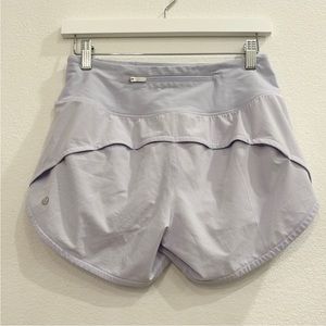 Lululemon Speed Up Mid-Rise Lined Short 4"
Pastel Blue ( lilac) light purple 4